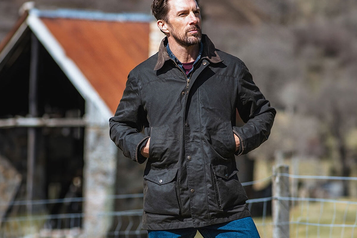 Man wearing a barn jacket whilst out