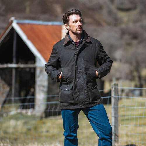 Farmer wearing Hoggs Of Fife Kelso Wax Jacket