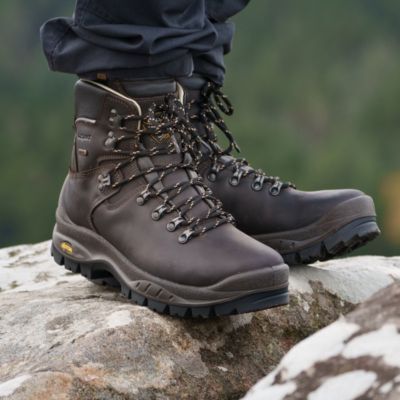 walking boots on rocky ground with heel locking system