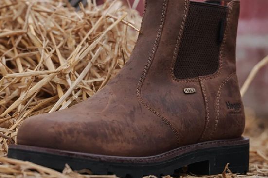 hoggs of fife shire pro waterproof dealer boots sitting on hay