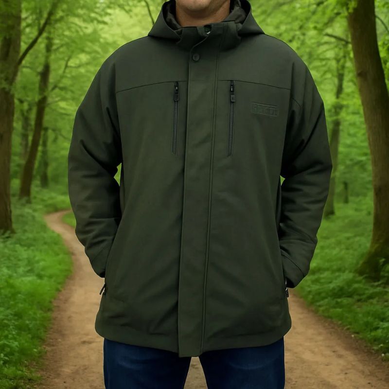 Man walking in forest wearing Game Outlander Jacket
