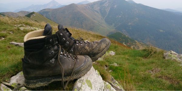 wet walking boots on a hillside after rain
